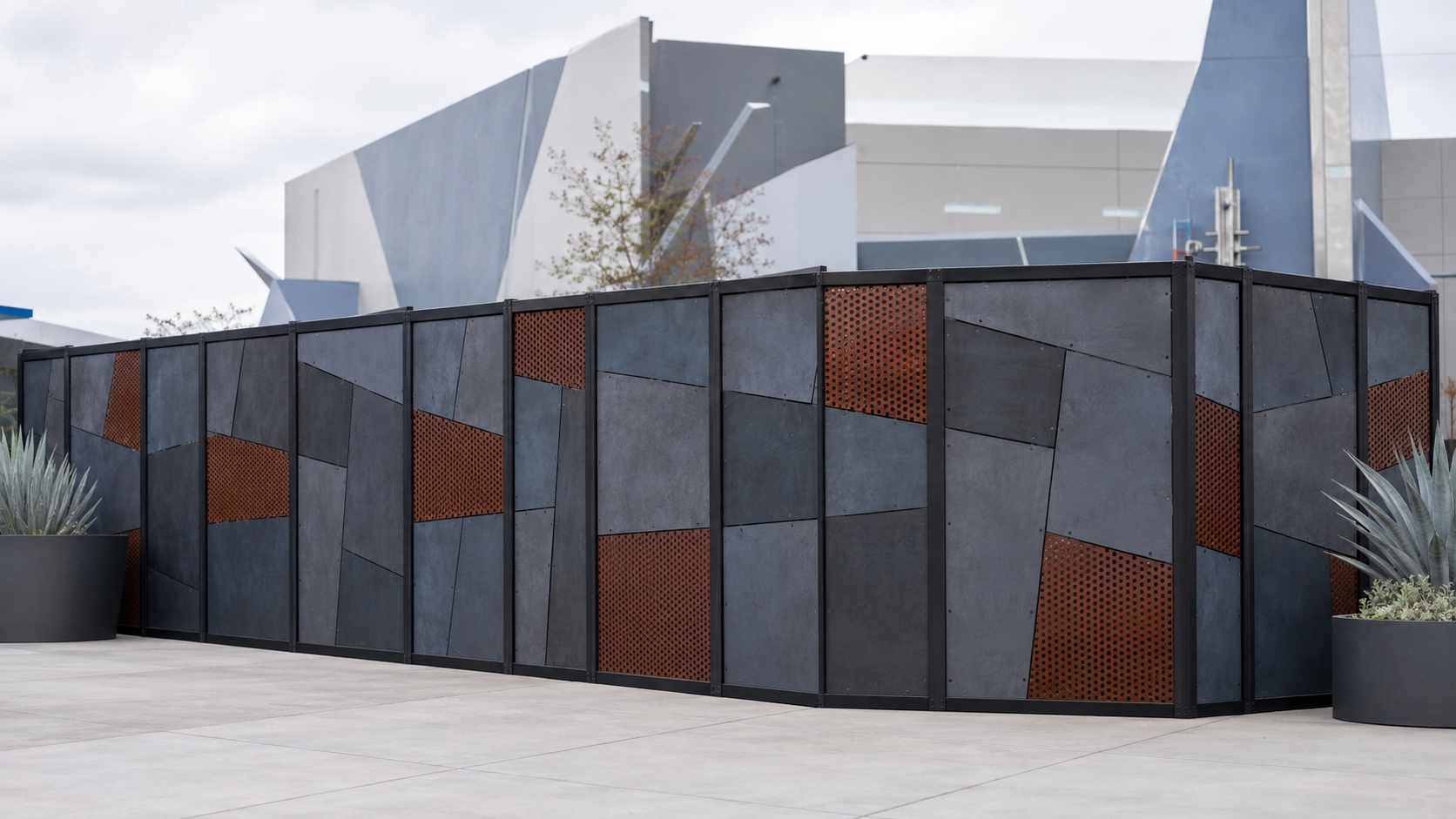 Themed construction fencing and graphics installed around an active work area